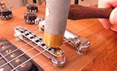 Photo: fret hammer making string notches