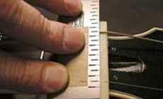 Setting the string spacing